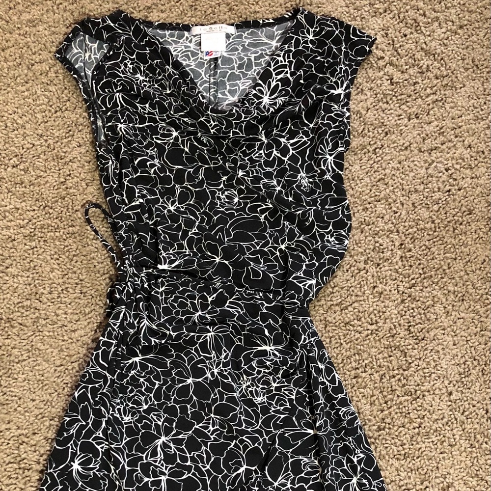 Dress with split sleeve